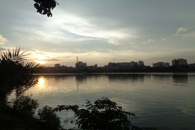 a body of water with a city in the ba.jpg